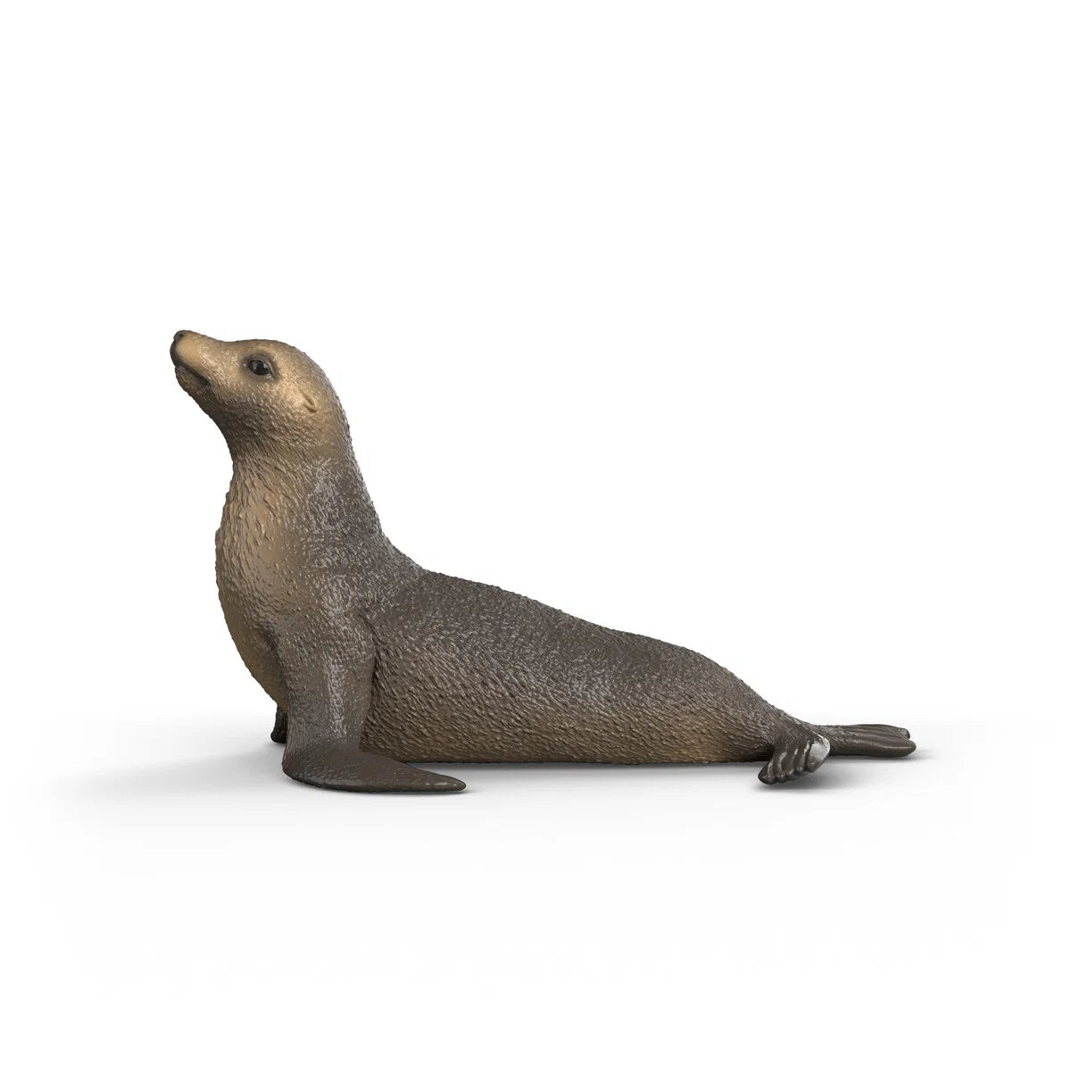 Schleich sjölejon figur med brun päls och upphöjt huvud, realistisk modell av sjölejon vid havskust.