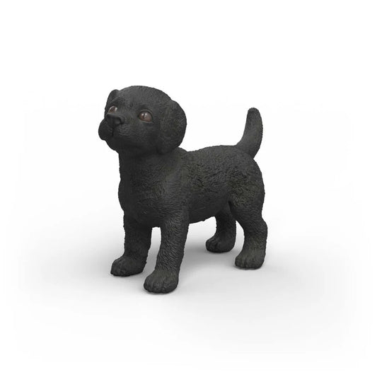 Schleich svart Labrador Retriever valp figur med svart päls och hängande öron, realistisk modell av labradorvalp.