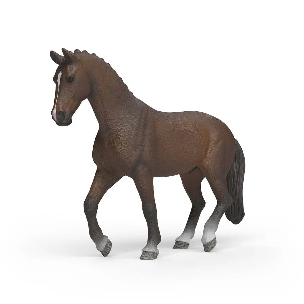 Schleich KWPN valack figur med mörkbrun päls, flätad man och vita benmarkeringar, realistisk dressyrhäst.