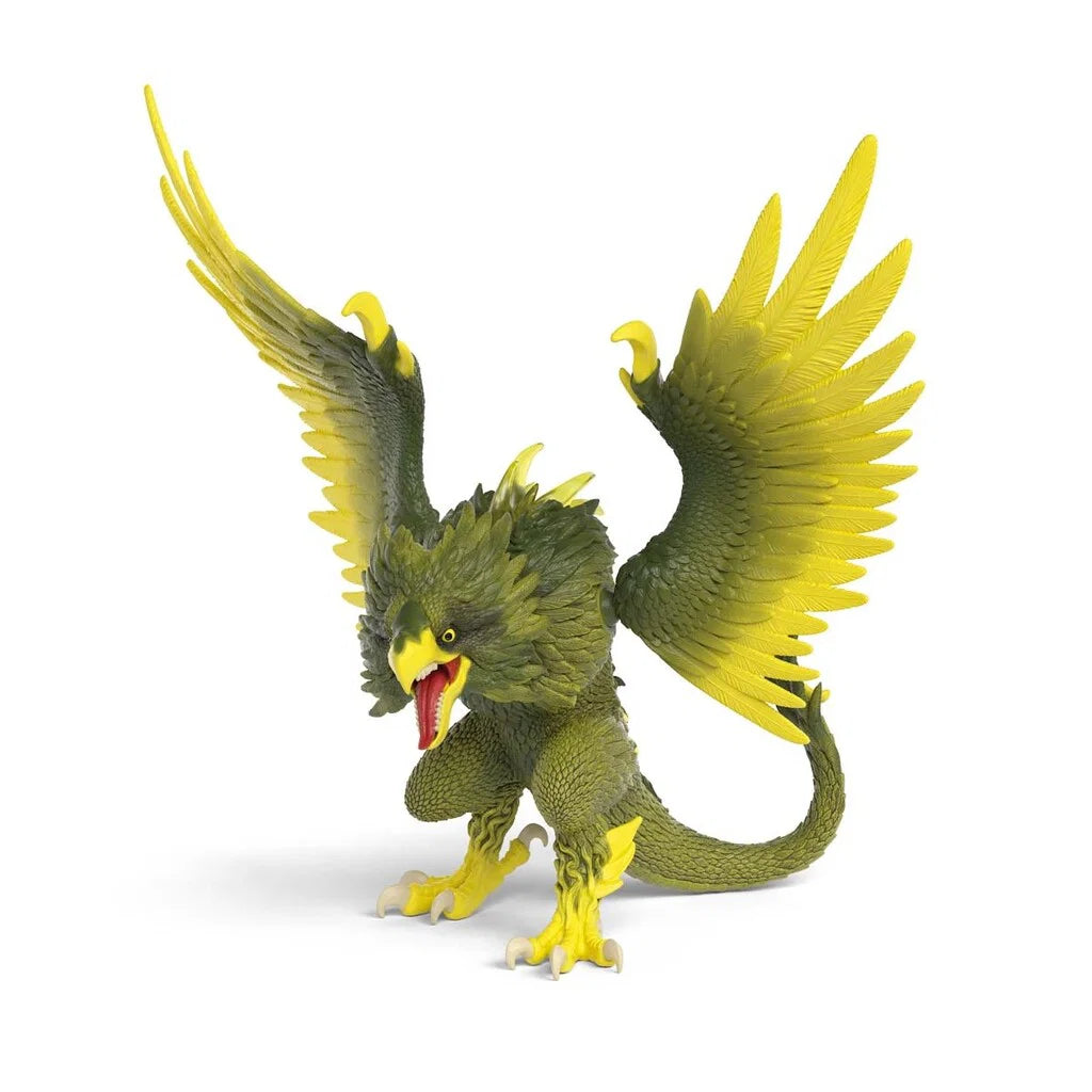 Schleich ELDRADOR CREATURES Djungelraptor med gröngul fjäderdräkt, stora vingar och kraftiga klor i stridsberedskap.