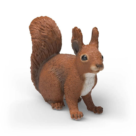 Schleich ekorre figur med rödbrun päls och fluffig svans, realistisk modell av ekorre i skogsmiljö.